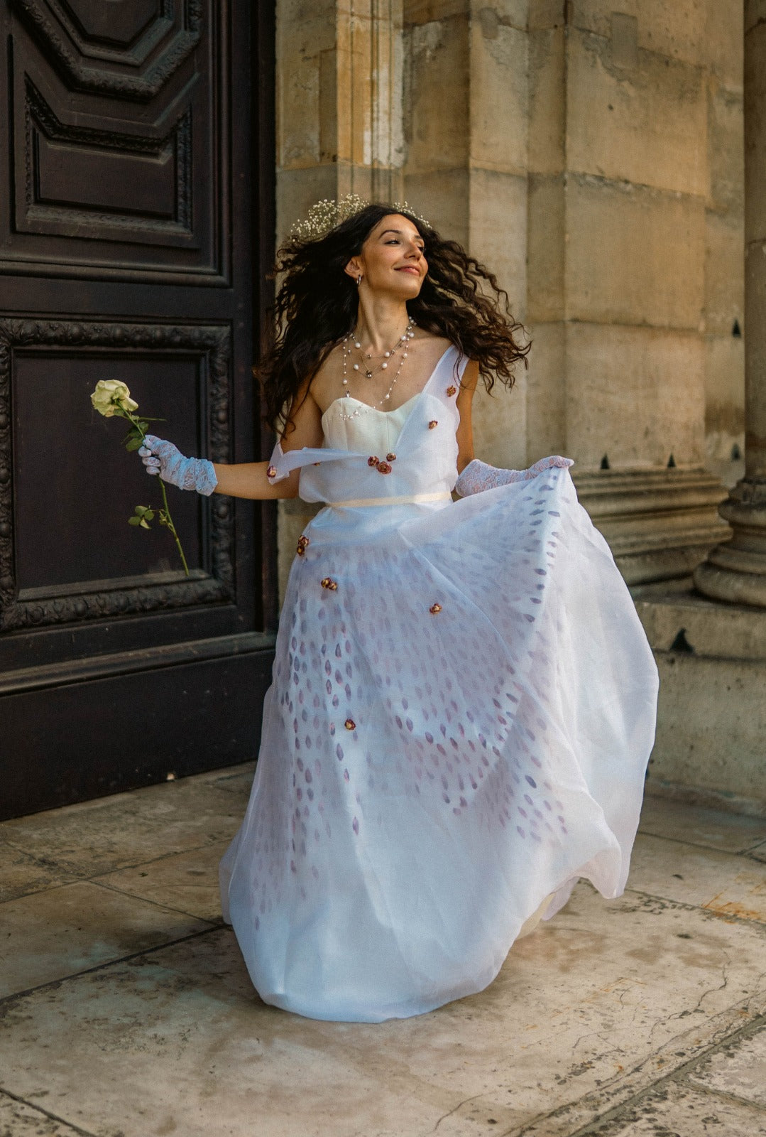 The Venus Dress — hand-painted duchesse satin gown with sheer organza overlay and dried roses